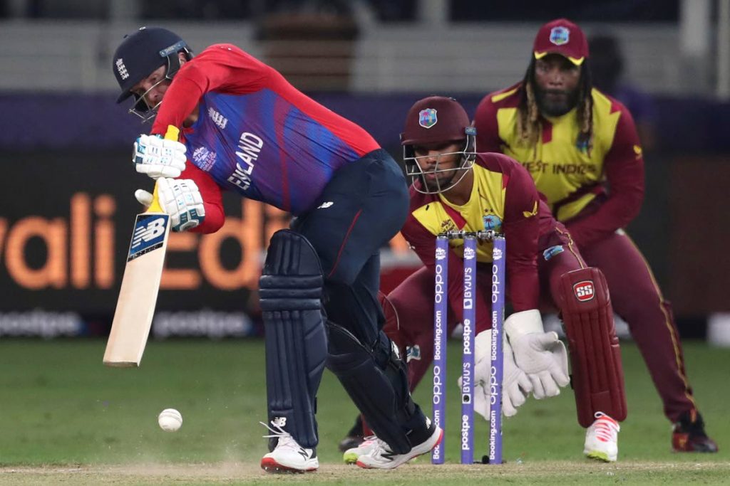 England’s Jason Roy plays a shot off the bowling of West Indies’ Akeal Hosein during the ICC T20 World Cup match at the Dubai International Cricket Stadium, in Dubai, UAE, on Saturday. England won by six wickets. AP Photo - Aijaz Rahi
