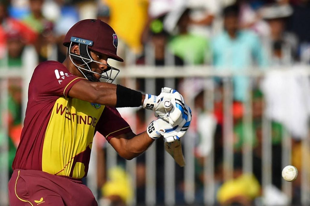 West Indies' Nicholas Pooran plays a shot during the ICC men’s Twenty20 World Cup cricket match between Bangladesh and West Indies at the Sharjah Cricket Stadium in Sharjah, UAE on October 29, 2021. (AFP PHOTO) - 