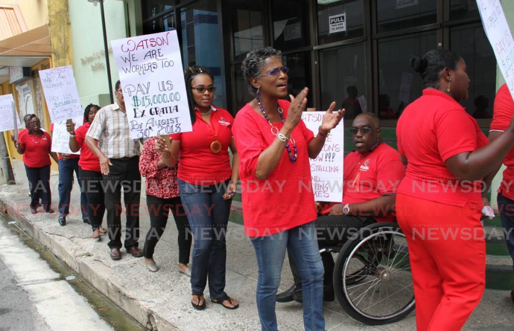 In this photo taken in 2018, Public Services Association workers represented by Banking, Insurance and General Workers Union protest outside the association’s head office on Abercromby St, Port of Spain against the slow pace of negotiations on outstanding wages. - FILE PHOTO/SUREASH CHOLAI