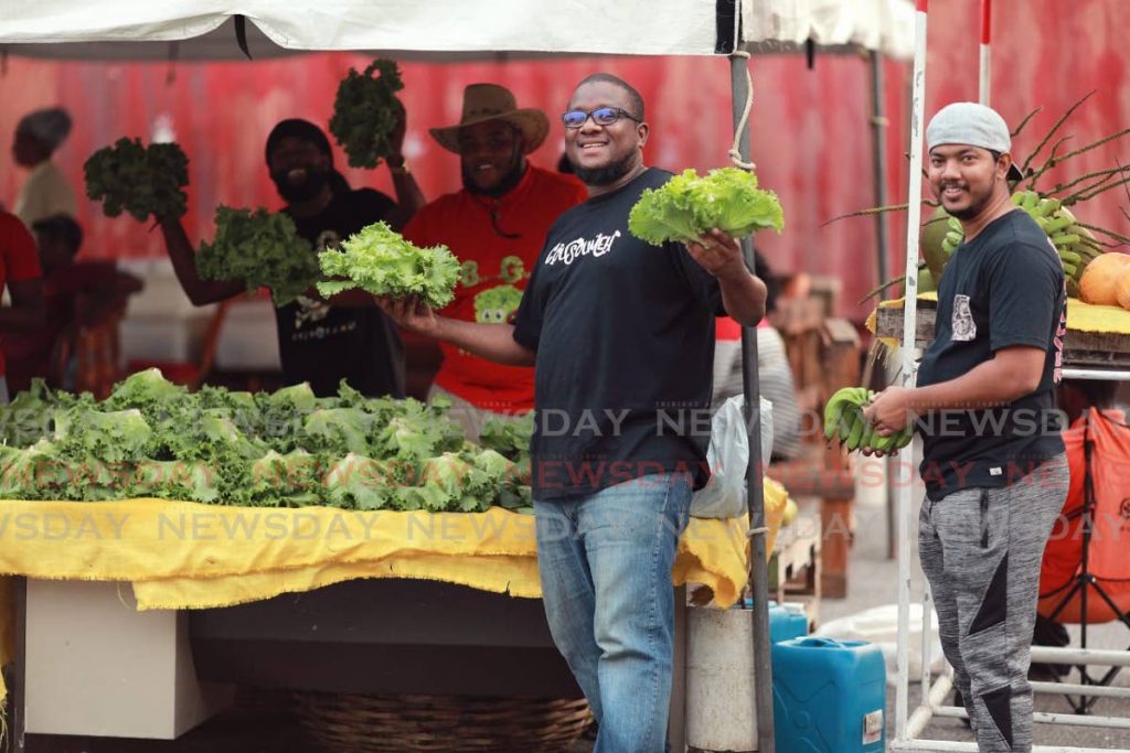 GREEN HANDS: Agripreneur and founder of NGO WhyFarm Alpha Sennon, centre, who spoke at the NOW Nestlé Caribbean Youth Summit held on October 5-6. FILE PHOTO - 