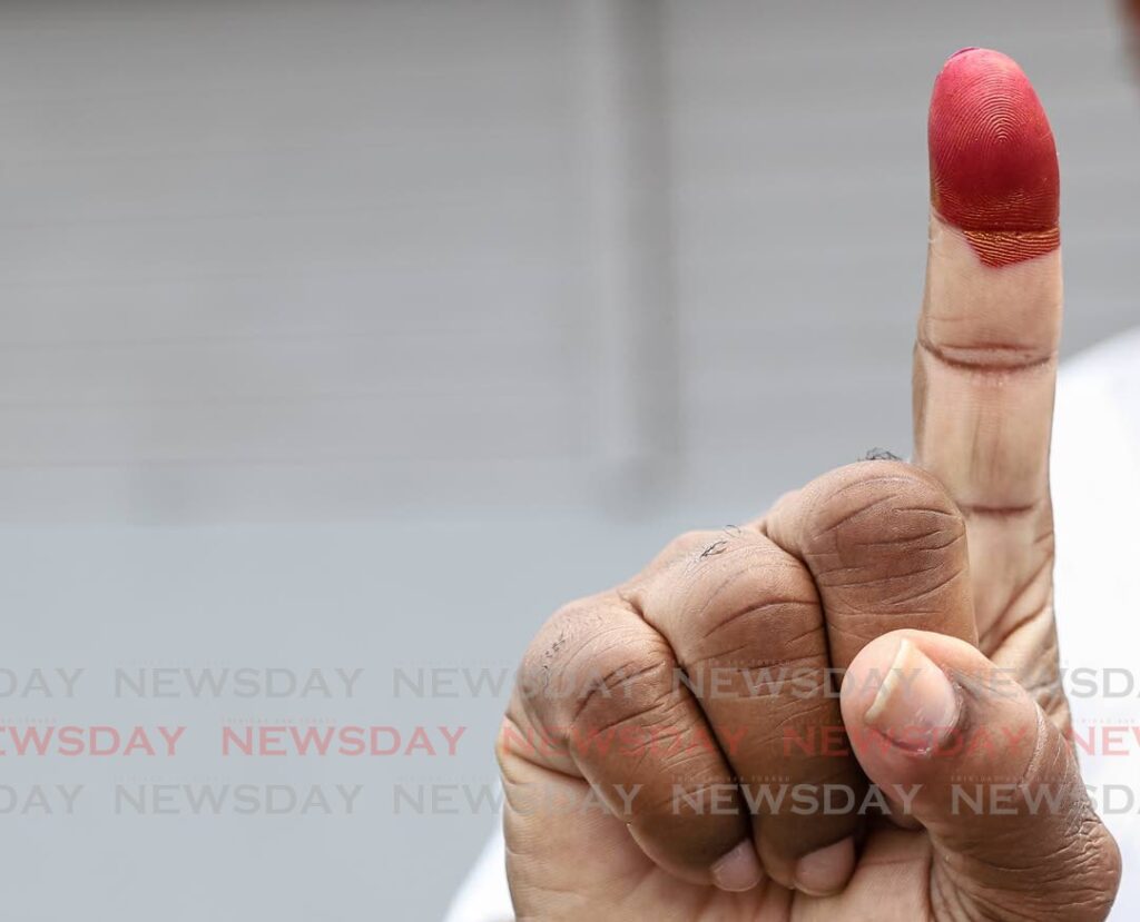 FILE PHOTO: A finger stained with ink after voting.  - 