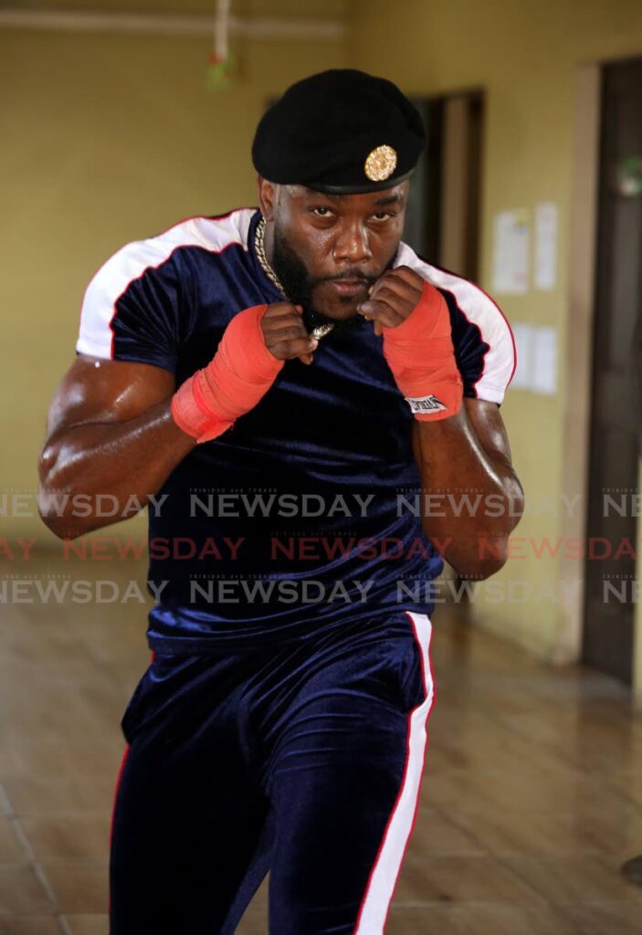 Marvin “Swappi” Davis shows off his boxing moves while training at the Sea Lots Community Centre. - SUREASH CHOLAI