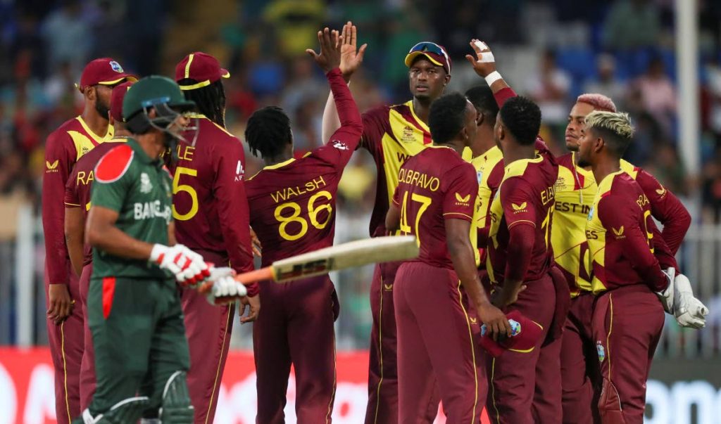 West Indies players celebrate the dismissal of Bangladesh’s Liton Das during the ICC Twenty20 World Cup match in Sharjah, UAE, on Friday. AP Photo - 