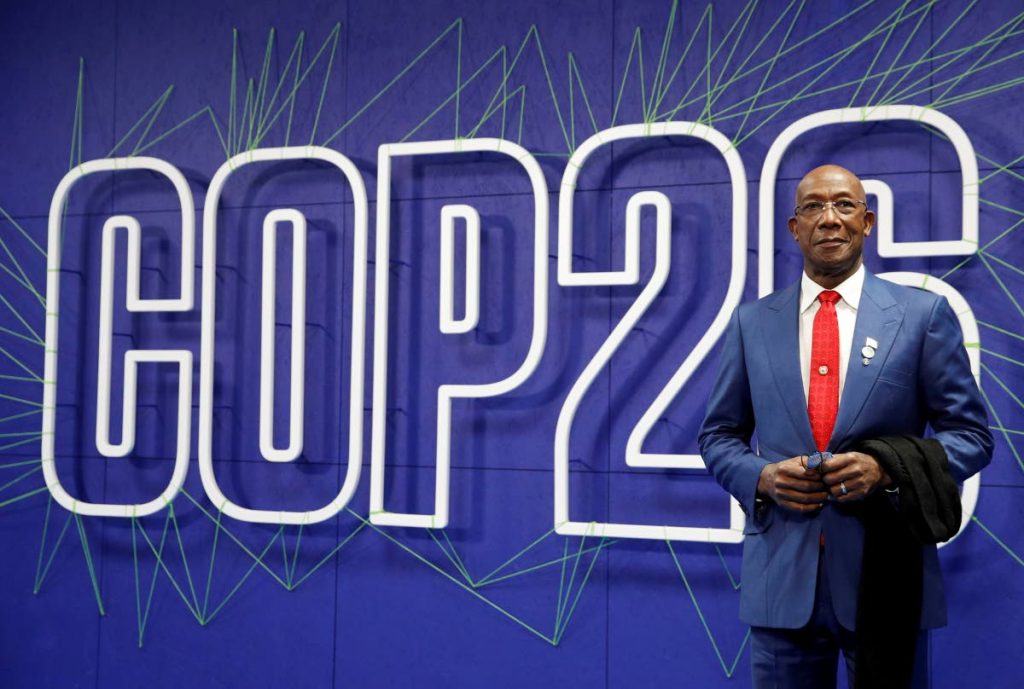 Prime Minister Dr Keith Rowley arrives for the COP26 summit at the Scottish Event Campus (SEC) in Glasgow, Scotland on November 1. On his return from London on Saturday, Rowley announced TT would continue its hydrocarbon industry. - AP PHOTO