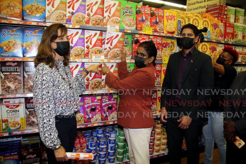 From left: Massy Stores CEO  Roxane De Freitas, Trade and  Industry Minister Paula Gopee-Scoon and Supermarket Association president Rajiv Diptee at Massy Stores, Trincity Industrial Estate, Monday. - SUREASH CHOLAI