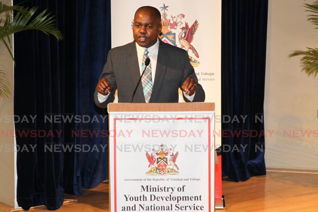 Minister of Youth Development and National Service Foster Cummings delivering the feature address during the appointment ceremony for the Advisory Committee for the Development of a National Service Programme. - Photo by Roger Jacob