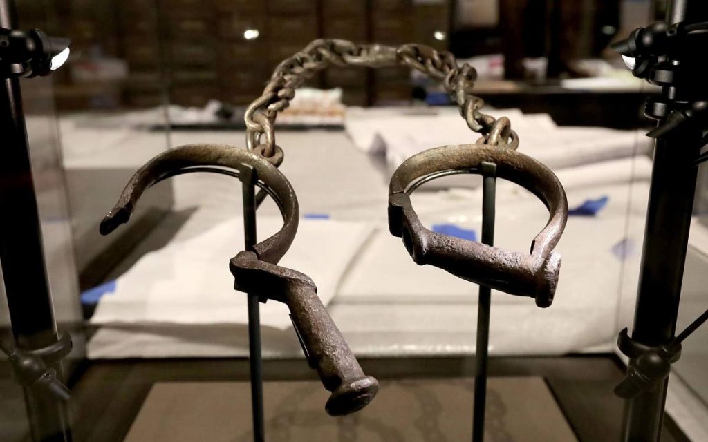 Slave shackles on display at Smithsonian’s National Museum of African American History and Culture when it opened in 2016. Photo taken from travelandleisure.com - 