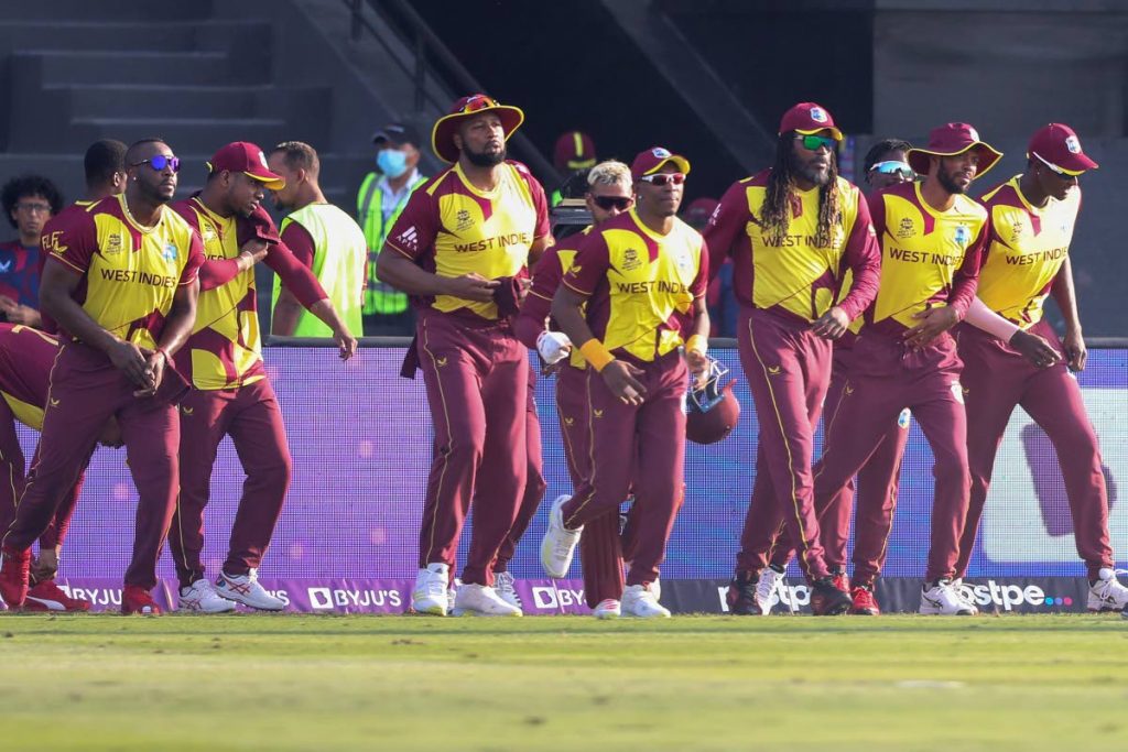 West Indies players take the field for the second innings during the ICC Twenty20 World Cup match against Australia in Abu Dhabi, UAE, on Saturday. AP Photo - 