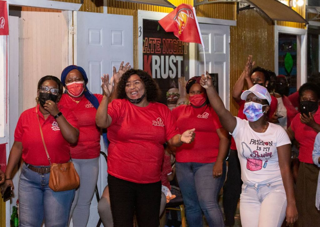 PNM supporters cheer on Saturday in support at the opening of a district office for PNM Tobago leader and Signal Hill/Patience Hill candidate Tracy Davidson-Celestine. - David Reid