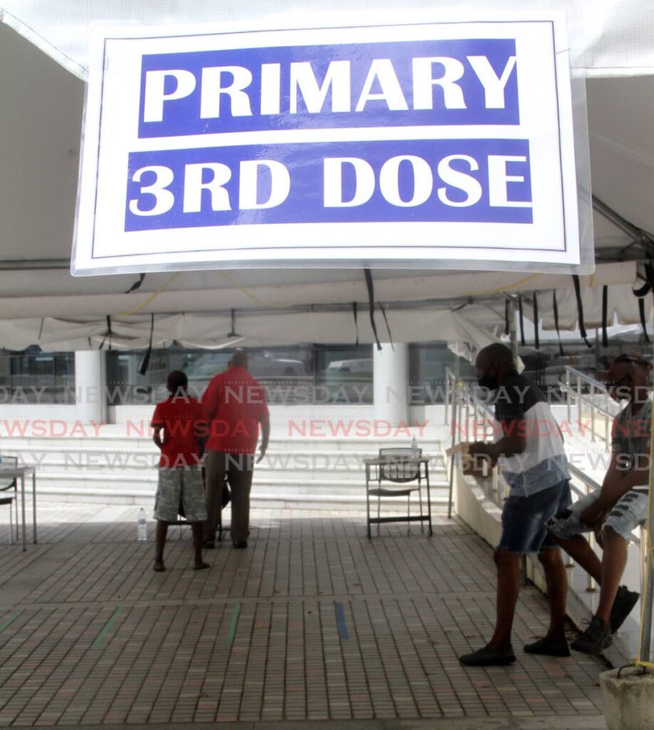 A tent designated for people to receive the third primary dose of a covid19 vaccine  at the Southern Academy for the Performing Arts, San Fernando, had a slow turnout on the first day of the programme on November 11.  - PHOTO BY ANGELO MARCELLE
