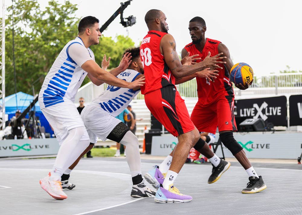 TT men's 3x3 players Moriba De Freitas, right, and compatriot Adrian Joseph, second from right, battle against Guatemala during Friday's Americup tournament in Miami, Florida.  Courtesy FIBA 3x3 Americup