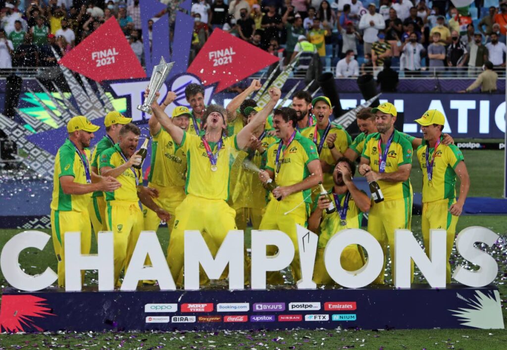 Australian cricketers celebrate after winning the ICC Twenty20 World Cup final against New Zealand, in Dubai, UAE, on Sunday. (AP Photo) - 