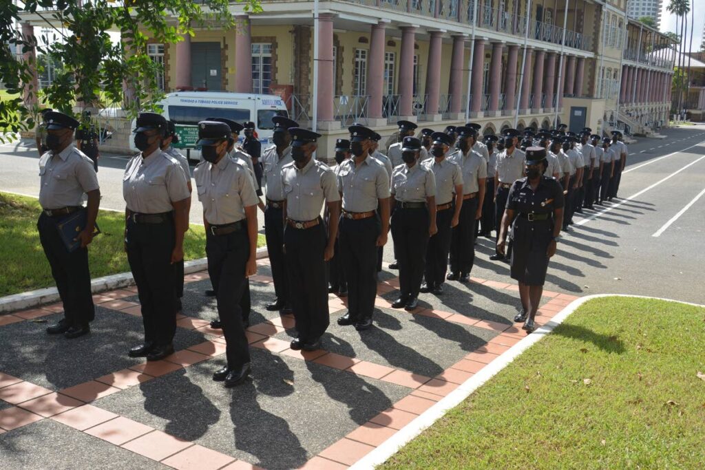 FRESHYLY MINTED: Batch 1 of 2021, SQUAD A-C, entering the gymnasium at the Police Academy in St James for their graduation ceremony on Saturday. PHOTO COURTESY TTPS 