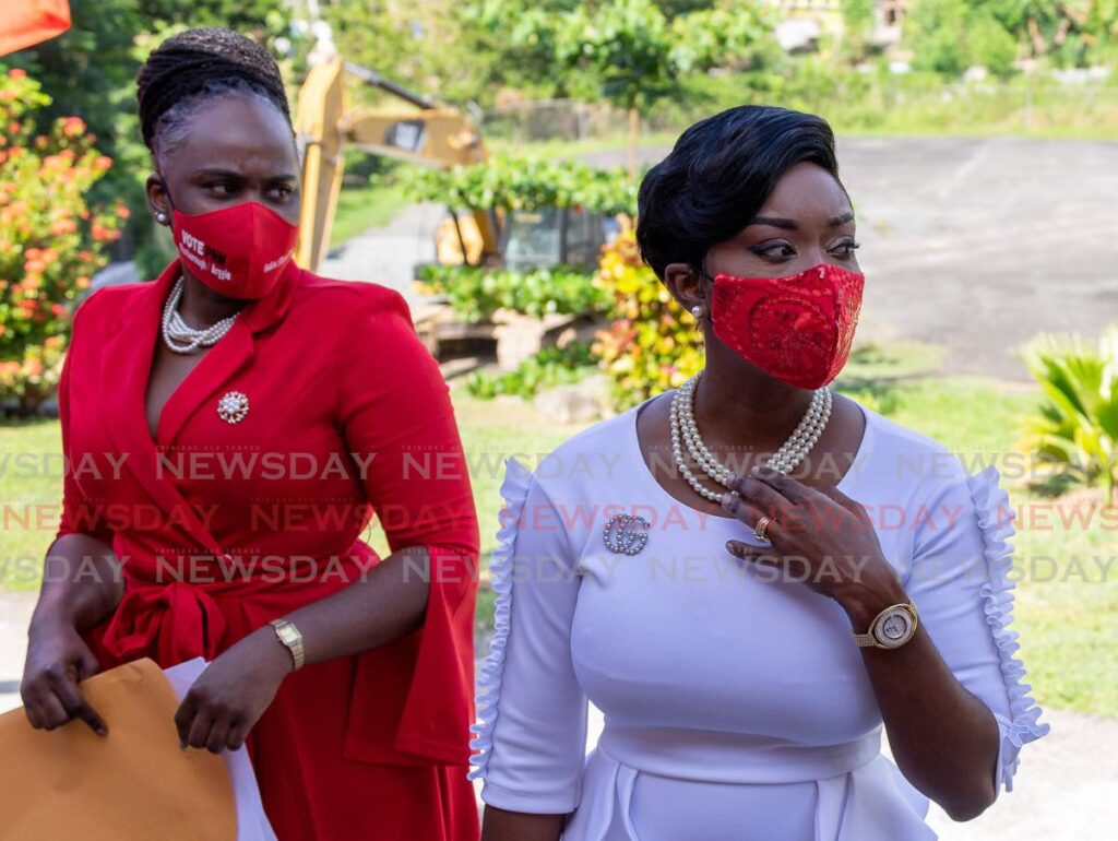 PNM candidate for Roxborough/Argyle Nadine Stewart-Phillips, right, arrives at the Pembroke Community Centre on Monday to file her nomination papers for the December 6 THA election.  - Photo by David Reid