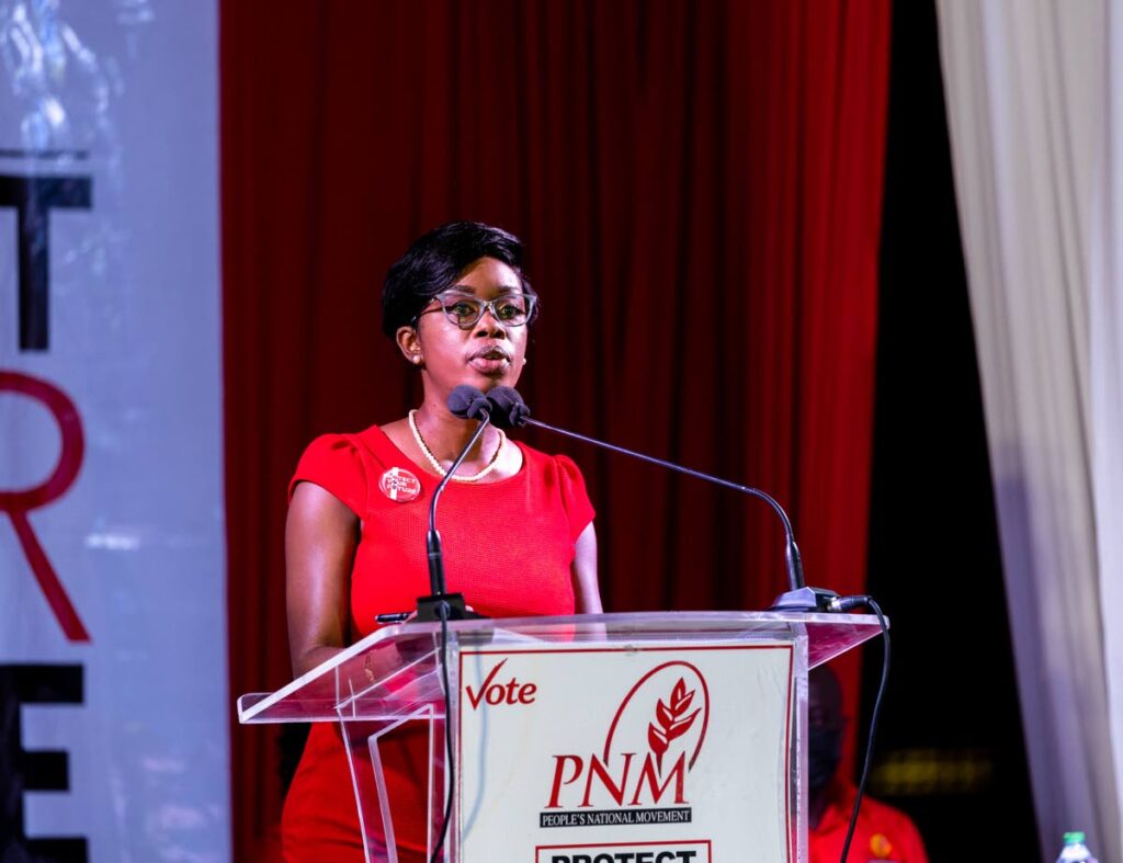 Nadine Stewart-Phillips speaks to supporters during a political meeting on Monday at the Calder Hall playing field. PHOTO COURTESY PNM - 