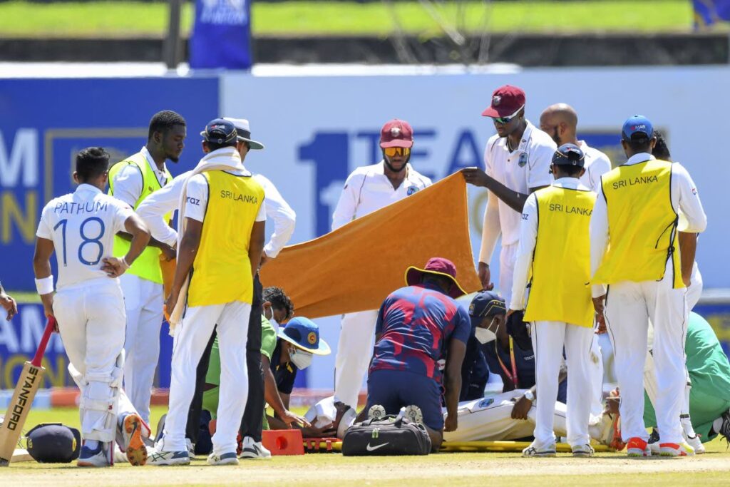 Doctors move West Indies’ Jeremy Solozano on to a stretcher after his injury during the first day of the first Test against Sri Lanka at the Galle International Cricket Stadium in Galle on November 21.   - 