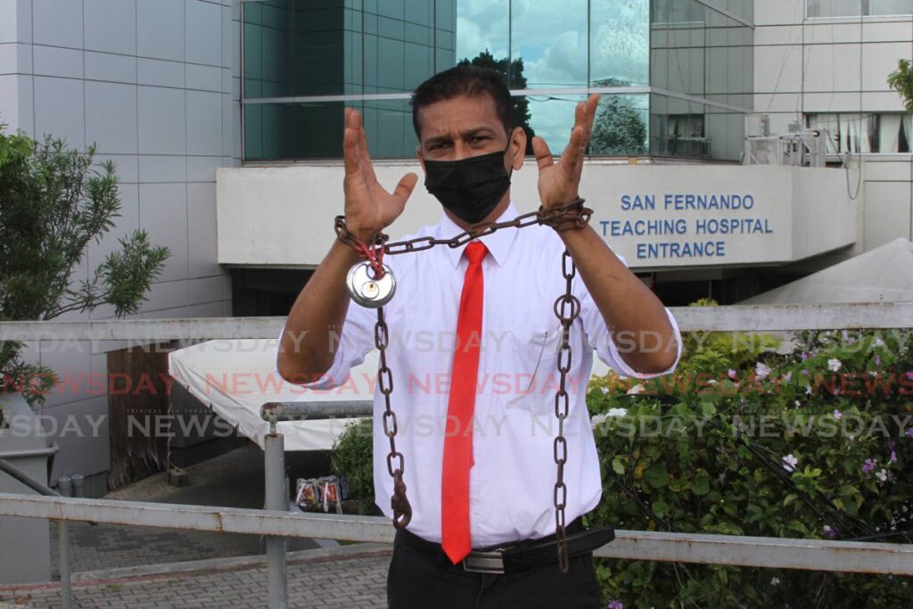 One-man protest by Ricardo Goolcharan, a ward manager at the San Fernando General Hospital. - Marvin Hamilton