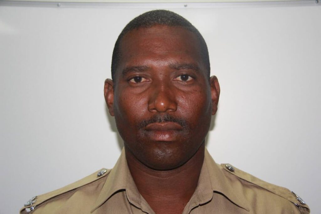 GUNNED DOWN: Prison officer Trevor Serrette who was gunned down while tending to his Valencia fruit stall on Friday afternoon.
PHOTO COURTESY PRISON SERVICE 