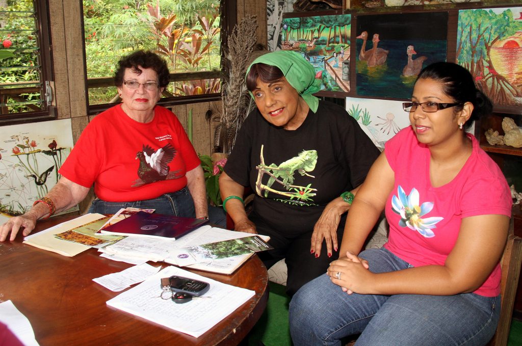 LADIES OF THE TRUST: President of the Pointe-a-Pierre Wild Fowl Trust Molly Gaskin (centre) chats with Sunday Newsday last week during an interview at the Trust. She is joined by vice president Karilyn Shephard (left) and education officer Tamara Goberdahn.