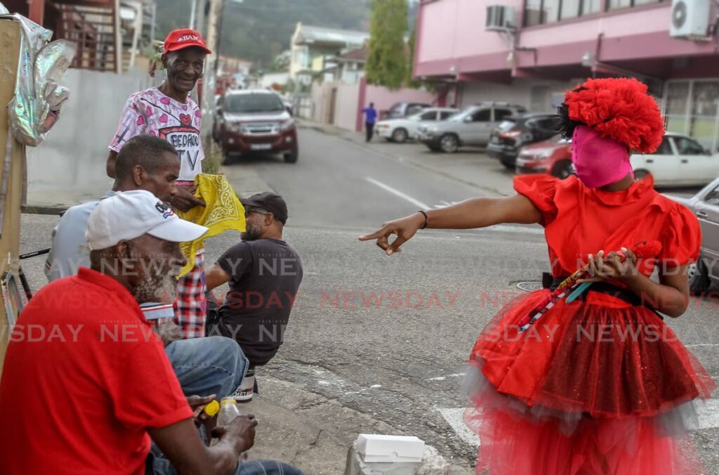 The baby doll is one of TT’s traditional Carnival characters. The doll symbolises an illegitimate baby and the character accuses male passers-by of being the baby's father. It reflects the history of families led by single mothers.  - FILE PHOTO/AYANNA KINSALE 