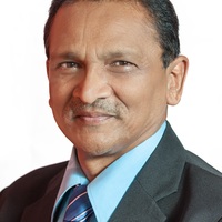 Dr Kumar Mahabir. 