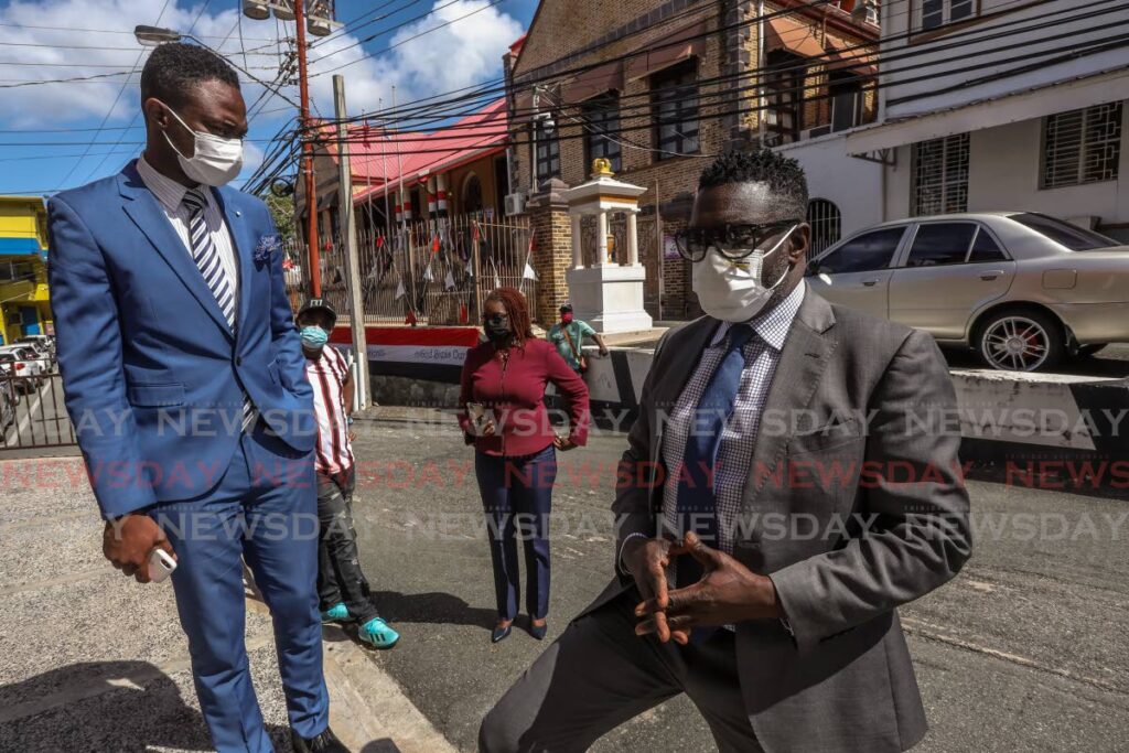 PDP political leader Watson Duke and deputy political leader Farley Augustine outside the Assembly legislature building, Scarborough, Tobago on February 2.   Augustine was sworn in as Chief Secretary on December 9 while Duke is the deputy Chief Secretary of the THA. - JEFF K MAYERS