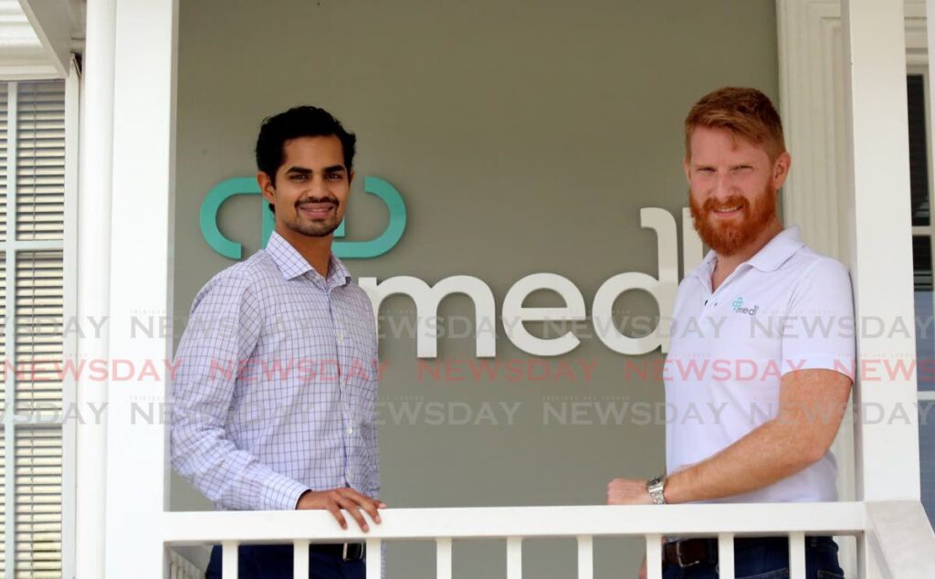 Medl co-founders Kiran Mathur Mohammed, left, and Edward Inglefield, winners of the 2021 TT Chamber of Industry and Commerce technology award. - File photo/Sureash Cholai