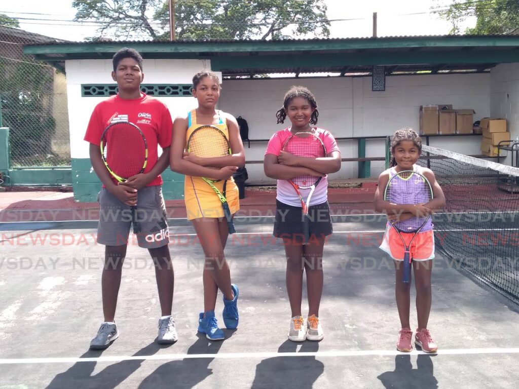 Yeshowah Campbell-Smith and his sisters (left-right) Em-Miryam, Abba and Rukha, at the St Mary's Tennis Courts, St Clair. - 
