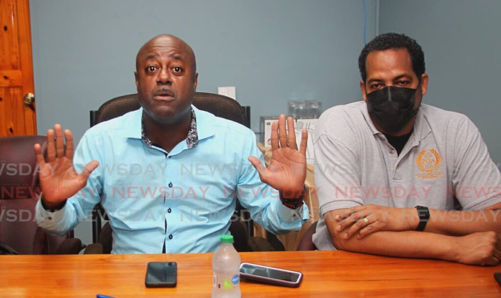 President of the Prison Officers Association Ceron Richards, left, general secretary Lester Walcott at a media conference at the association's offices, Railway Road, Arouca on Tuesday. - ROGER JACOB