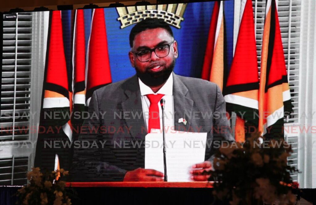 Guyana President Dr Mohamed Irfaan Ali gives a virtual address at the TTMA president's dinner and award ceremony at the Hyatt Regency in Port of Spain, Tuesday. - ROGER JACOB