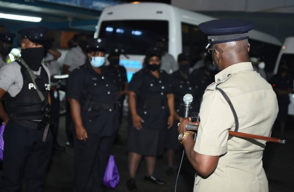 Senior Tobago police brief officers at the Scarborough Police Station on Monday before polls open for the THA election. Photo courtesy TTPS