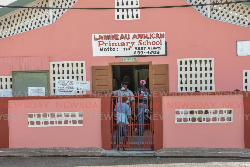 Tobago voters get instructions at the Lambeau Anglican Primary School. - Jeff K. Mayers 