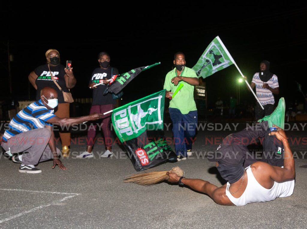 PDP supporters celebrate victory in the THA election in Roxborough. - David Reid