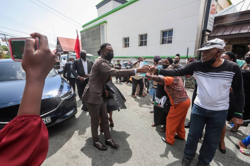 Deputy political leader of the PDP Farley Augustine greets supporters upon arrival at the Assembly Legislature Building, Scarborough on December 9 after being sworn in as Chief Secretary of the THA. - Jeff K. Mayers