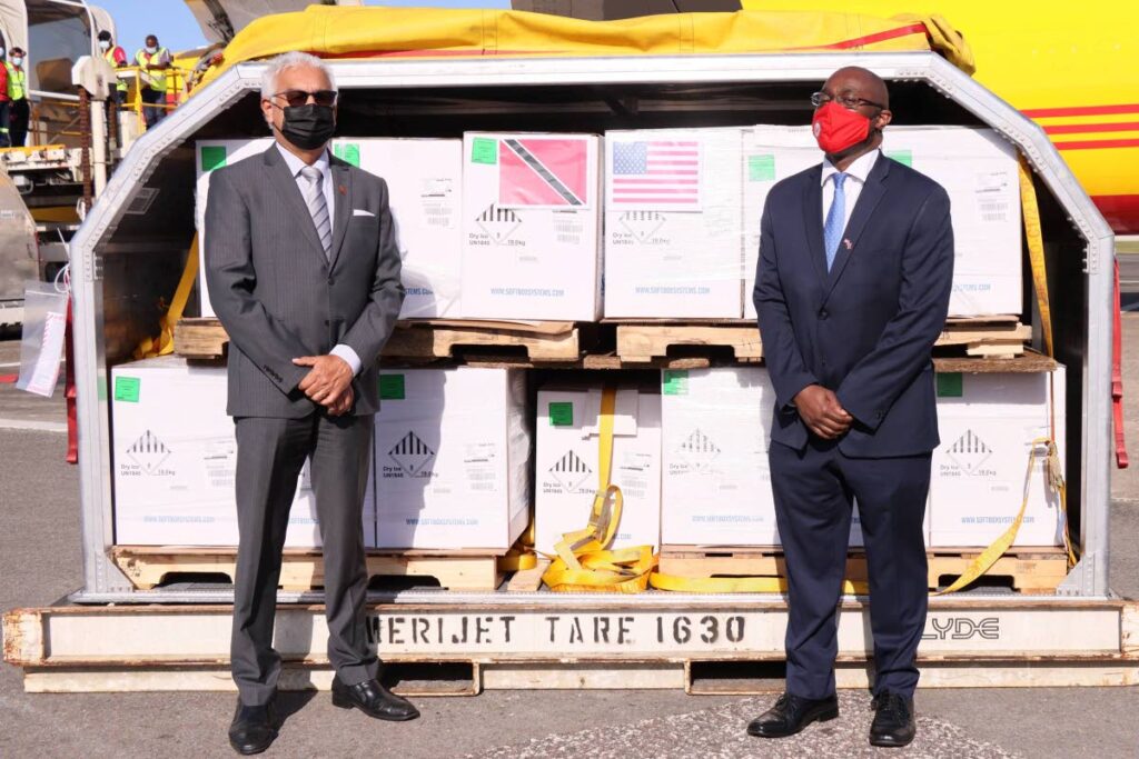 Minister of Health Terrence Deyalsingh and U.S. Embassy Chargé d'Affaires Shante Moore.