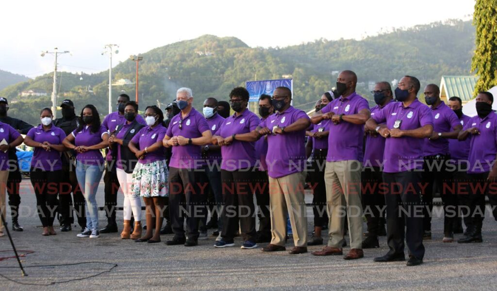 Some of the participants stand in unison during the launch of Run Crime Out by the Belmont Police Station on Friday. - SUREASH CHOLAI