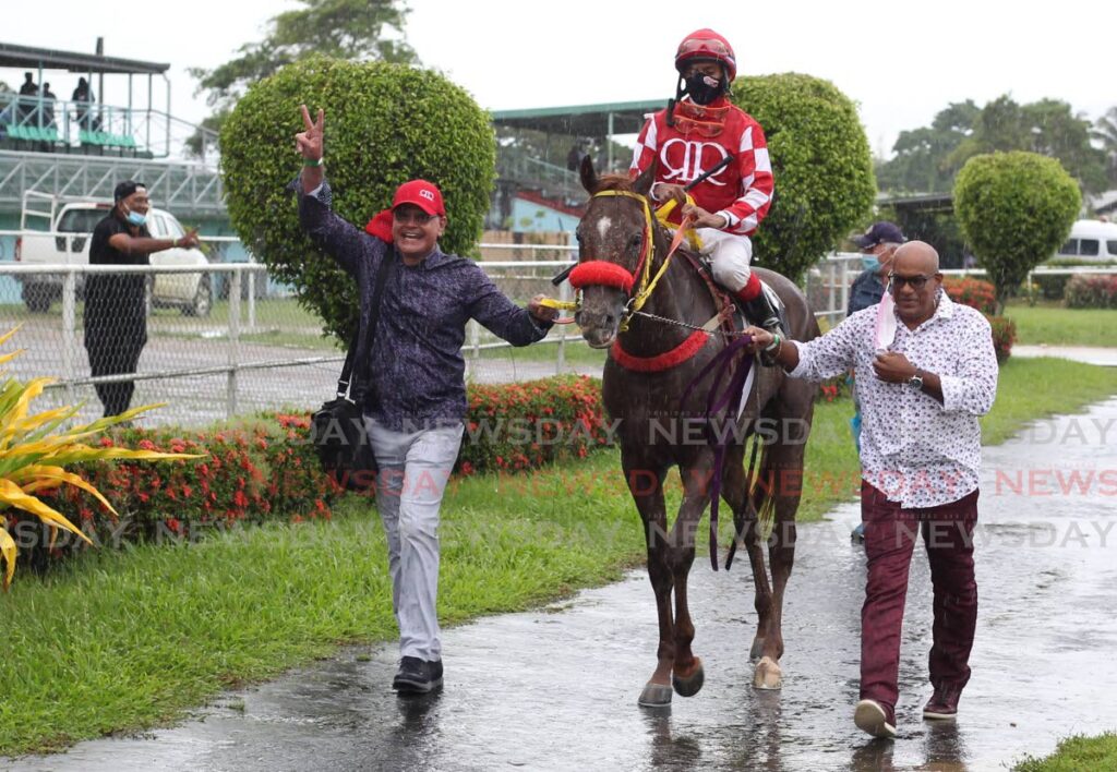 Stroke of Luck, ridden by Brian Boodramsingh, won the Carib Brewery Trinidad Derby at the Santa Rosa Park, Arima on December 11, 2021.  - ROGER JACOB