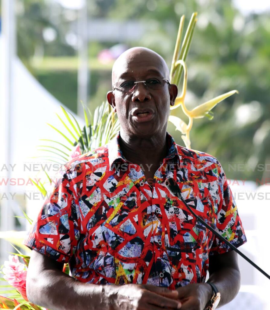 Prime Minister Dr Keith Rowley speaks at the opening of the community swimming pool in Morvant on Thursday. Rowley announced vaccination policy for public sector employees that requires them to be vaccinated or remain at home without pay. - Photo by Sureash Cholai