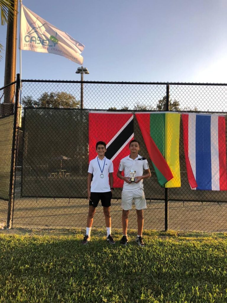 TT’s Luca Shamsi, left, and Kale Dalla Costa show off their silver and gold medals won at the Casely International Tennis Championships in Florida last week.  - Courtesy Tennis Patrons