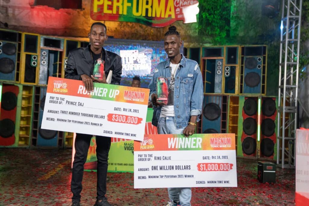 Prince Saj, left, second place winner and King Calie winner of the Magnum Top Performa competition pose with their winnings. - 