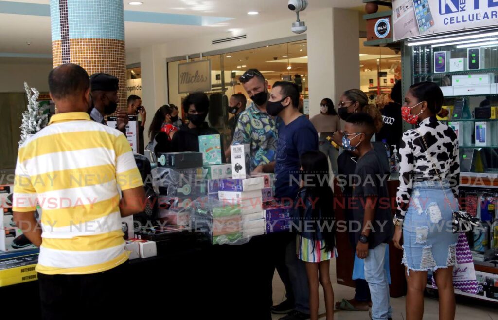 Electronic items were a hot seller at Trincity Mall on Sunday. - SUREASH CHOLAI