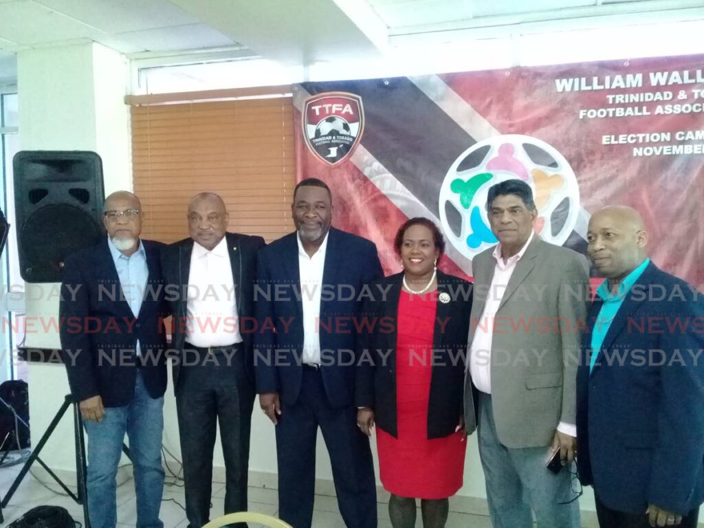 In this November 2, 2019 file photo veteran sports broadcaster and director Anthony Harford (2R) stands alongside fellow United TTFA members Keith Look Loy, from left, Sam Phillip, William Wallace, Susan Joseph-Warrick, Anthony Harford and Clynt Taylor.  - Jelani Beckles