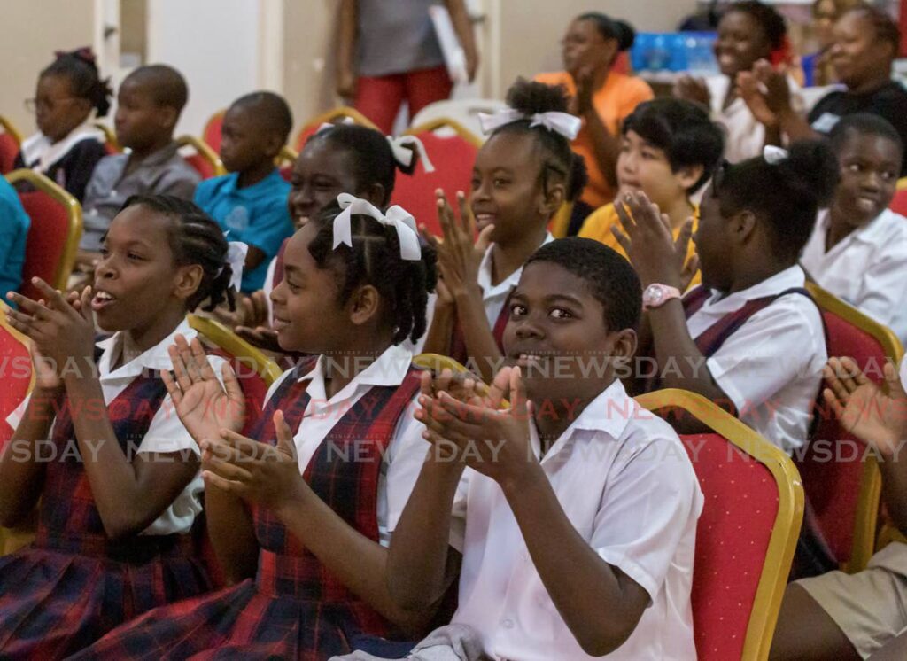 In this November 2019 file photo, students cheer for their favourite team at a tourism quiz for primary schools. Most children have not had classes in schools since March 2020 owing to covid19 restrictions, but have had online sessions. - FILE PHOTO/DAVID REID