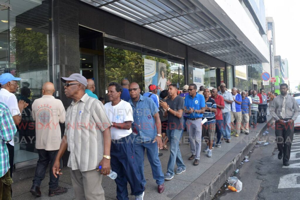 In this January 31, 2020 file photo TSTT pensioners and CWU members protest for their pensions outside a bank in Port of Spain. Retired Telco/TSTT workers are again appealing to TSTT for their pensions. - File photo
