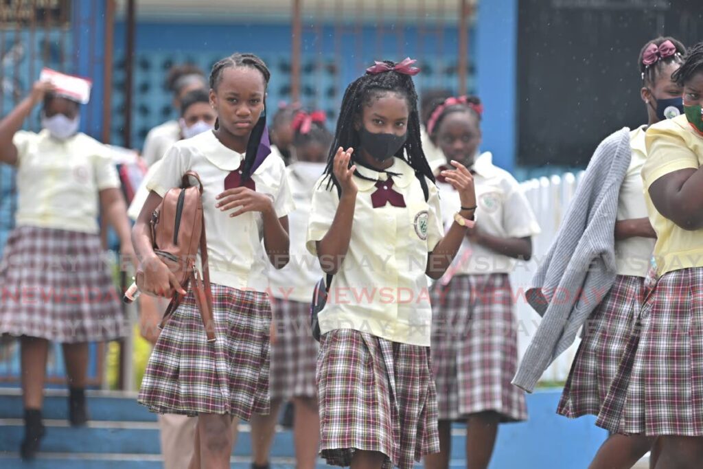 FILE PHOTO: Signal Hill Government Primary School students at the school compound on August 20, 2020. - 