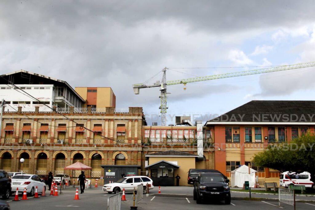 FILE PHOTO: A crane at the construction site of a new central block at the Port of Spain General Hospiatal on July 4, 2021. - 