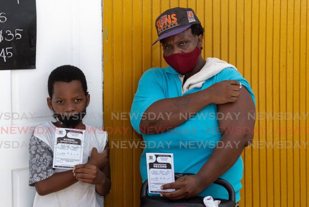 Daequinn Richardson, 12, of Happy Haven School, Signal Hill got his second Pfizer shot along with mother Natoya Reid in Plymouth, Tobago on September 28, 2021. Government will discuss the vaccination of children five-11 based on WHO-approval for its use in this age group. - David Reid