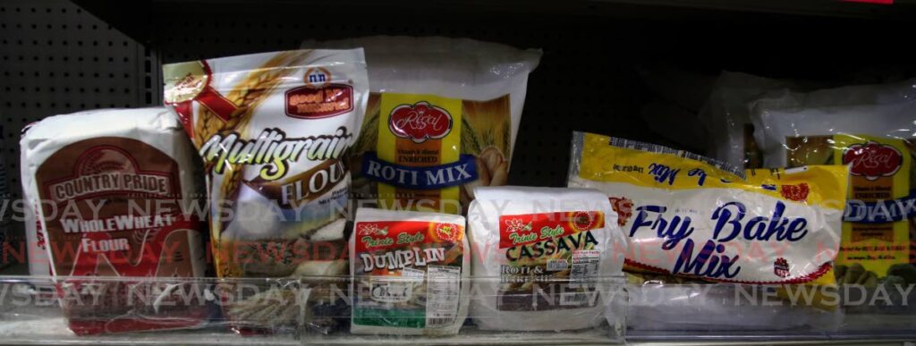 File photo: National Flour Mills and Nutrimix flour products on sale at a supermarket in San Juan. Photo by Sureash Cholai