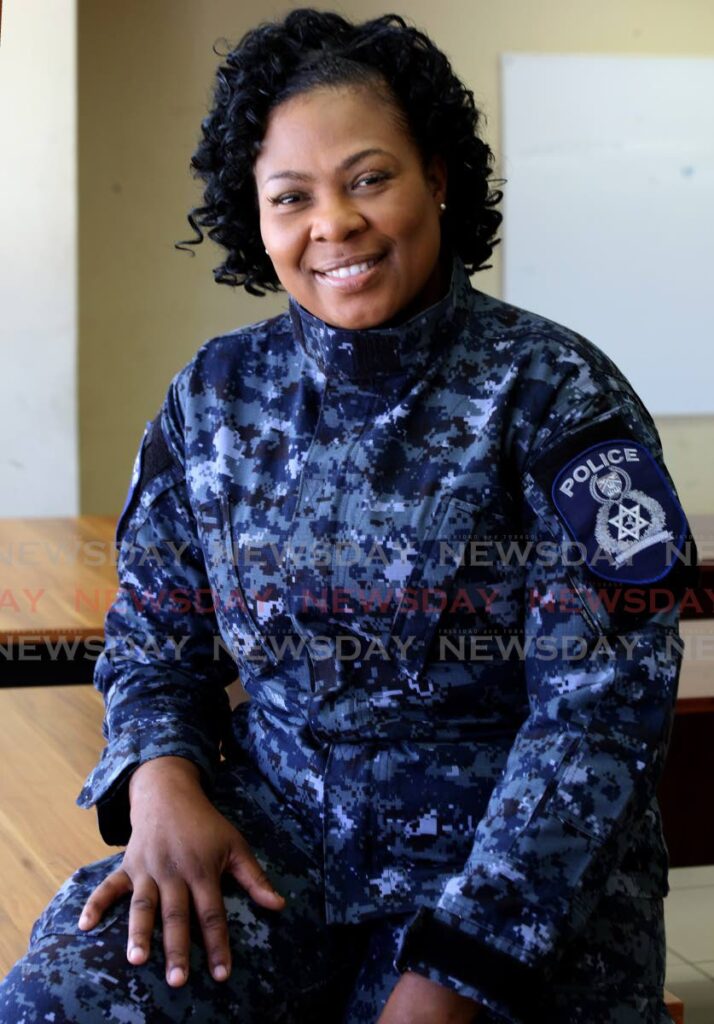 Stacey-Ann Martin has been a police since 2006. She has a dream to one day open a food business. - PHOTO BY SUREASH CHOLAI