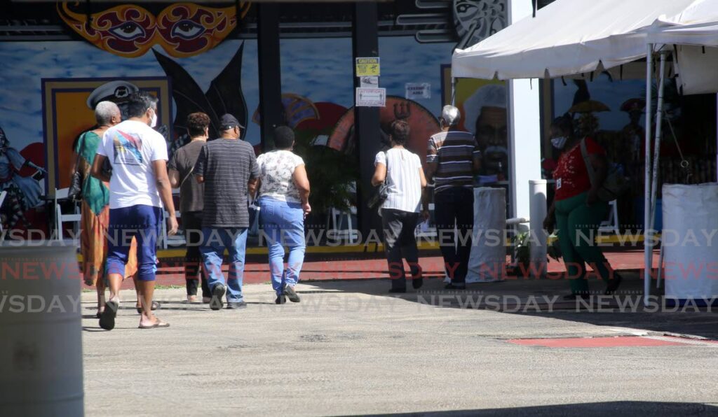 People entering the  Paddock of the Queen's Park Savannah in Port of Spain for their covid19 vaccine. - Photo by Sureash Cholai